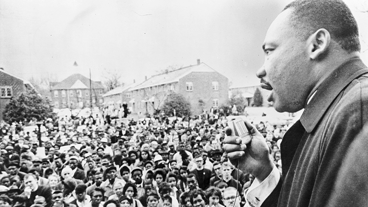Martin Luther King, Jr. speaking to a crowd