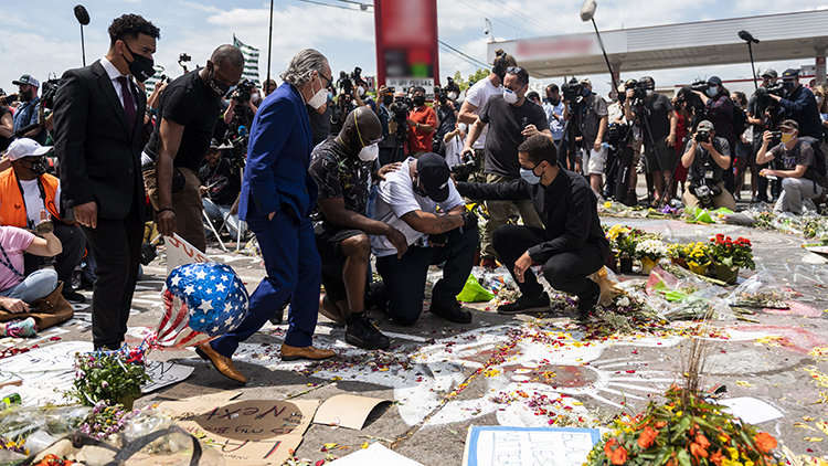 This image shows George Floyd's Brother at a Prayer Vigil.